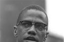 FILE - Black Muslim leader Malcolm X is shown addressing rally in Harlem, New York in this June 29, 1963 file photo. Activists, actors, and politicians are remembering civil rights leader Malcolm X with a ceremony Saturday Feb. 21, 2015 at the New York site in Harlem where he was killed 50 years ago. (AP Photo/File)