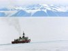 A United States Coast Guard icebreaker works in McMurdo Sound keeping a channel free for supply ship..