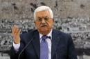 Palestinian president Mahmud Abbas gestures during a meeting of the Palestinian leadership in Ramallah on September 11, 2014