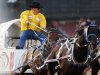 Harden races his wagon in the Rangeland Derby Chuckwagon event during the 100th anniversary of the Calgary Stampede Rodeo in Calgary