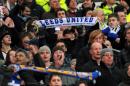 Leeds United supporters celebrate after their team during a match at Old Trafford in Manchester, England on January 3, 2010