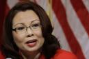 GOP senator attacks his opponent, a war hero, for her Asian heritage