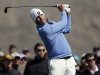 Matt Kuchar tees off on the third hole in the final round of play against Hunter Mahan during the Match Play Championship golf tournament, Sunday, Feb. 24, 2013, in Marana, Ariz. (AP Photo/Ted S. Warren)