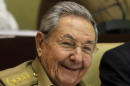 Cuba's President Raul Castro smiles during a twice-annual legislative session at the National Assembly in Havana, Cuba, Friday, Dec. 19, 2014. When the leaders of the U.S. and Cuba had their first phone conversation in more than 50 years, they were not at a loss for words. As President Barack Obama told the story at his news conference Friday, he opened his call with Cuban President Raul Castro _ brother of famously longwinded Fidel _ with a 15-minute monologue, then apologized for taking so much time. "He said, 'Don't worry about it, Mr. President,'