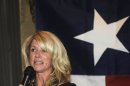 File - In this July 25, 2013 file photo, Democrat Texas State Senator Wendy Davis speaks at a fundraiser, Thursday, July 25, 2013, in Washington. Two people with knowledge of the decision say Davis will run for Texas governor. (AP Photo/Nick Wass, File)