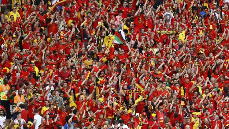 Belgium fans cheer after Divock Origi scored a goal during the 2014 World Cup Group H soccer match between Belgium and Russia at the Maracana stadium