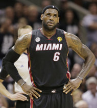 Miami Heat's LeBron James (6) pauses between plays against the San Antonio Spurs during the first half at Game 5 of the NBA Finals basketball series, Sunday, June 16, 2013, in San Antonio. (AP Photo/Eric Gay)