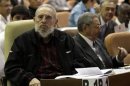 Former Cuban leader Fidel Castro attends the opening session of the National Assembly of the People's Power with brother Raul in Havana