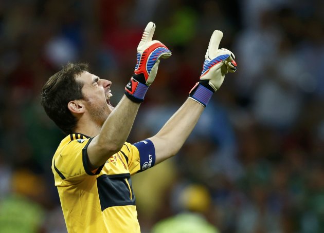 Spain's goalkeeper Casillas celebrates after third goal, scored by Torres during their Euro 2012 final soccer match against Italy at the Olympic stadium in Kiev