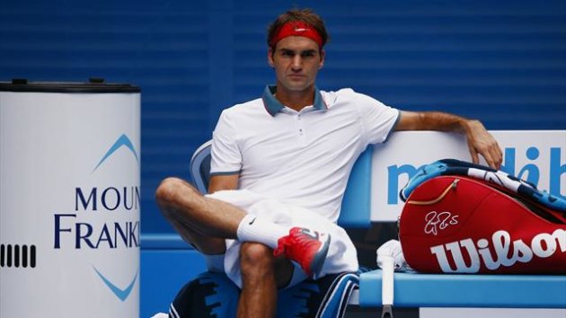 Roger Federer of Switzerland relaxes during a change of ends in his men's singles match against Teymuraz Gabashvili of Russia (Reuters)