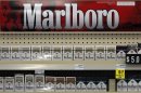 In this Wednesday, July 17, 2013, photo, Marlboro cigarettes are on display in a CVS store in Pittsburgh. Altria reports quarterly earnings on Tuesday, July 23, 2013. (AP Photo/Gene J. Puskar)