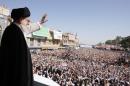 Iran's Supreme Leader Ayatollah Ali Khamenei waves to the crowd in the holy city of Qom, south of Tehran