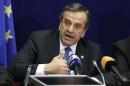 Greece's Prime Minister Samaras holds a news conference at the end of a European Union leaders summit in Brussels