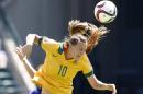 Australia's Emily van Egmond heads a ball during first half FIFA Women's World Cup quarter-final soccer action against Japan in Edmonton, Alta., Saturday, June 27, 2015. (Jeff McIntosh/The Canadian Press via AP) MANDATORY CREDIT