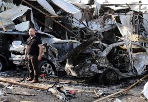 A man inspects the site of a car bomb explosion in&nbsp;&hellip;