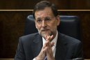 El jefe de gobierno español Mariano Rajoy asiste a una sesión del Parlamento en Madrid, el miércoles 13 de junio de 2012. La tasa de interés que España tendría que pagar para recaudar dinero en los mercados mundiales de bonos siguió aumentando el miércoles. (Foto AP/Daniel Ochoa de Olza)