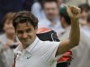 Roger Federer of Switzerland gestures to spectators after defeating Novak Djokovic of Serbia during a men's semifinals match at the All England Lawn Tennis Championships at Wimbledon, England, Friday, July 6, 2012. (AP Photo/Kirsty Wigglesworth)