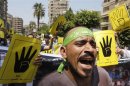 Los fieles a Mursi marchan en Egipto ante grandes medidas de seguridad