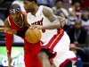 Miami Heat forward LeBron James (6) drives against Atlanta Hawks forward Josh Smith (5) in the first half of an NBA basketball game in Atlanta, Friday, Nov. 9, 2012. (AP Photo/John Bazemore)