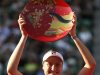 Petrova of Russia poses with her victory trophy after defeating Radwanska of Poland in their final match at the Pan Pacific Open tennis tournament in Tokyo