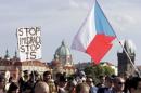 File photo of demonstrators marching during an anti-immigrants rally in Prague
