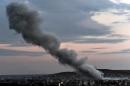 Smoke rises from an explosion in the Syrian town of Kobane after a US-led coalition air strike, as seen from the Turkish border in the southeastern village of Mursitpinar, Sanliurfa province, on October 18, 2014