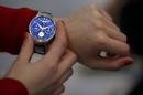 A hostess displays the Huawei Watch during the Mobile World Congress in Barcelona