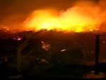 A huge fire that erupted as Hurricane Sandy ripped through New York City with near-hurricane force winds in the neighborhood Breezy Point in the borough of Queens in New York