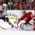 Red Wings goalie Jimmy Howard makes a save on Blackhawks Jonathan Toews in the 2nd period of Game 3 of their NHL Western Conference semi-finals hockey game in Detroit