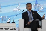 Singapore's Prime Minister Lee Hsien Loong talks during a dialogue session at the Asia-Pacific Economic Cooperation (APEC) CEO Summit in Nusa Dua, Indonesia resort island of Bali October 6, 2013. REUTERS/Beawiharta