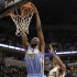 Denver Nuggets forward Corey Brewer, left, dunks in front of Indiana Pacers forward Gerald Green during the first half of an NBA basketball game in Indianapolis, Friday, Dec. 7, 2012. (AP Photo/AJ Mast)