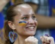 An Ukraine's fan cheers before their Group D Euro 2012 soccer match against France at Donbass Arena in Donetsk