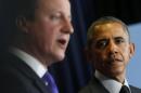 President Barack Obama listens as British Prime Minister David Cameron speaks during a news conference at the G7 summit in Brussels, Belgium, Thursday, June 5, 2014. (AP Photo/Charles Dharapak)