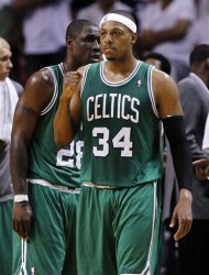 Boston Celtics' Paul Pierce (34) pumps his fist after a call was reversed to give the Celtics possession of the ball in the closing minutes of the fourth quarter in Game 5 of their NBA basketball Eastern Conference finals playoff series against the Miami Heat, Tuesday, June 5, 2012, in Miami. The Celtics won 94-90. (AP Photo/Lynne Sladky)