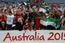 United Arab Emirates fans celebrate after their team beat Japan in the quarter-finals of the Asian Cup in Sydney on January 23, 2015