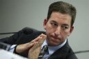Greenwald testifies before a Brazilian Congressional committee on NSA's surveillance programs, in Brasilia