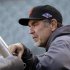 San Francisco Giants manager Bruce Bochy watches over a voluntary workout in preparation for Sunday's Game 6 of the National League championship baseball series against the St. Louis Cardinals, Saturday, Oct. 20, 2012, in San Francisco. (AP Photo/Ben Margot)