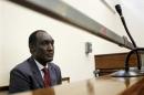 Exiled Rwandan General Faustin Kayumba Nyamwasa looks on during his court appearance in Johannesburg