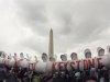 Demonstrators carry a replica of a pipeline during a march against the Keystone XL pipeline in Washington