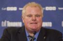 FILE - In this Tuesday, December 10 2013 file photo, Toronto Mayor Rob Ford speaks in Toronto. Rob Ford's lawyer said on Wednesday, April 30, 2014, that Ford will take a leave of absence to seek help for substance abuse. (AP Photo/The Canadian Press, Chris Young File)