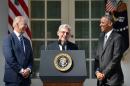 Judge Merrick Garland (C) speaks after US President Barack Obama (R) announced Garland's nomination to the US Supreme Court, in the Rose Garden at the White House on March 16, 2016