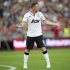 Manchester United's Rooney reacts after missing a penalty kick during their friendly soccer match against Barcelona in Goteborg, Sweden