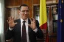 Romania's Prime Minister Victor Ponta gestures during an interview with Reuters in Bucharest