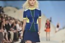 Fashion from the Tommy Hilfiger Spring 2014 collection is modeled on Monday, Sept. 9, 2013 in New York. (AP Photo/Bebeto Matthews)