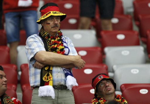 Germany's soccer team fans react after lost Euro 2012 semi-final soccer match against Italy at National Stadium in Warsaw