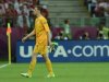 Polish goalkeeper Wojciech Szczesny leaves the pitch after receiving a red card