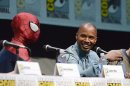 Spider-Man, left, and Jamie Foxx attend the "The Amazing Spider-Man 2" panel on Day 3 of Comic-Con International on Friday, July 19, 2103 in San Diego. (Photo by Jordan Strauss/Invision/AP)