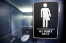 A sign protesting a recent North Carolina law restricting transgender bathroom access in Durham, North Carolina
