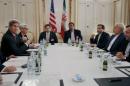U.S. Secretary of Energy Ernest Moniz, U.S. Secretary of State John Kerry and U.S. Under Secretary for Political Affairs Wendy Sherman meet with Iranian Foreign Minister Mohammad Javad Zarif at a hotel in Vienna