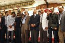 Senior opposition figure ElBaradei and Leftist leader Sabahi wave with their supporters during a news conference ahead of the planned protest against Egypt's President Mohamed Mursi, at the end of the month, in Cairo